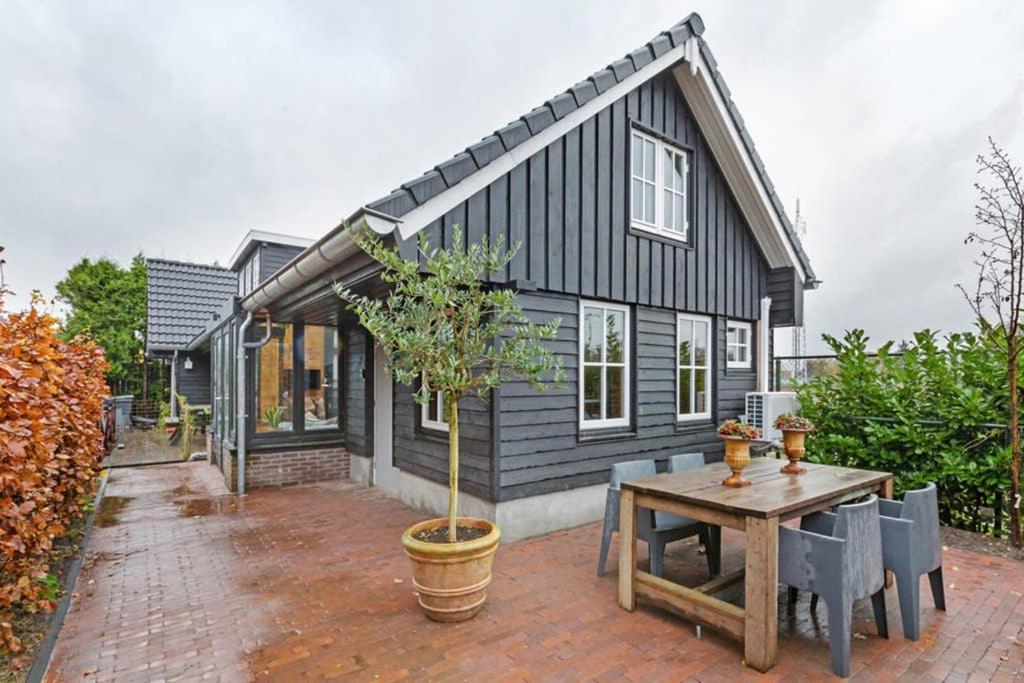 Hollandsche Rading Uniek Houten Huis Nabij Bos En Plassen מראה חיצוני תמונה